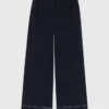 Baumwollhose mit Ledergürtel