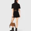Glänzende Tweed-Shorts