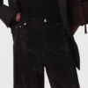 Jeans mit weitem Bein und Strasssteinen