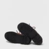 Schuhe mit klobiger Sohle