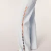 Weit geschnittene Jeans mit Strass-Ausschnitten